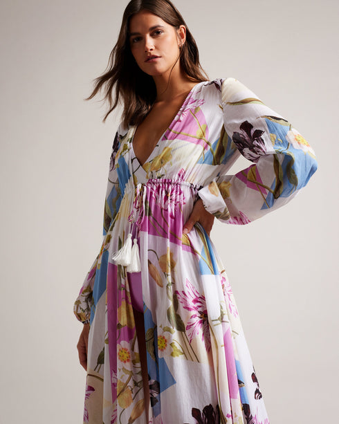 ROZLYN-Swimwear-Get ready to turn heads at the beach with the gorgeous ROZLYN cover-up. Our spliced floral print catches the eye, while the deep V-neck and floaty silhouette bring plenty of elegance. With long sleeves and a gathered waist with tassels, this cover-up is both stylish and comfortable. Bring on holiday season.By choosing Ted Baker cotton products, you're supporting our investment in the Better Cotton Initiative's mission. This product is sourced via a system of mass balance and therefore may no